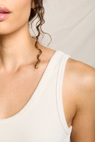 Perfect White Tee Blondie Structured Rib Bra Friendly Tank Sugar. Model is posing in the top.
