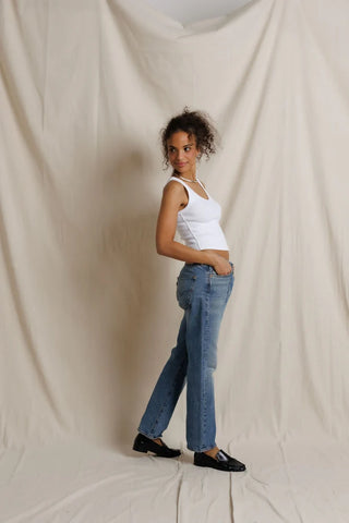 Perfect White Tee Blondie Structured Rib Bra Friendly Tank White. Model is posing in product.