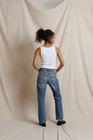Perfect White Tee Blondie Structured Rib Bra Friendly Tank White. Model is posing in product.