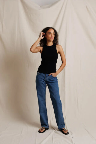 Perfect White Tee Daphne Structured Rib High Neck Tank True Black. Model is wearing the top and image is being shot on white background. 