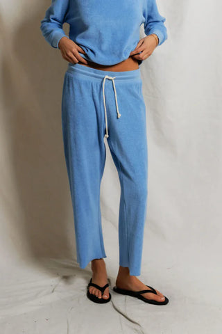 Perfect White Tee Eliana Loop Terry Draw String Pant Pacific Blue. Model is wearing the product and only the bottom half of her is showing. 