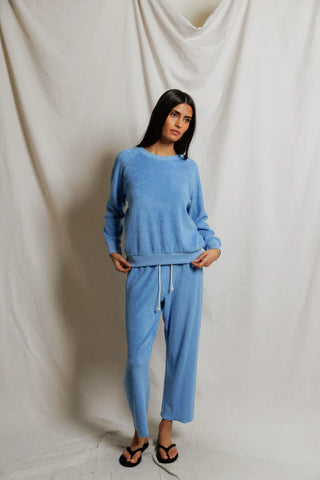 Perfect White Tee Eliana Loop Terry Draw String Pant Pacific Blue. Model is posing in the product.