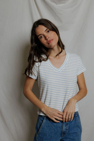 Perfect White Tee Elliot Brushed Sweater Strip V Neck Tee Pacific Stripe. Model is wearing the top. 