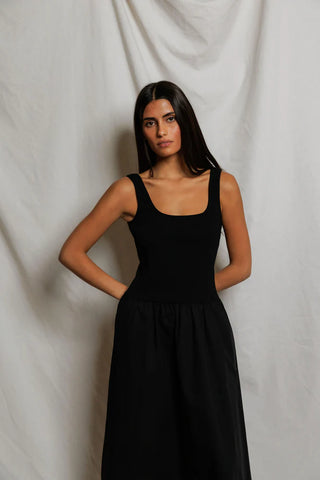 Perfect White Tee Fabiola Cotton Poplin Sleeveless Dress True Black. Model is wearing the dress and image is shot on white background. 