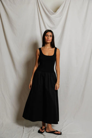 Perfect White Tee Fabiola Cotton Poplin Sleeveless Dress True Black. Model is wearing the dress and image is shot on white background. 