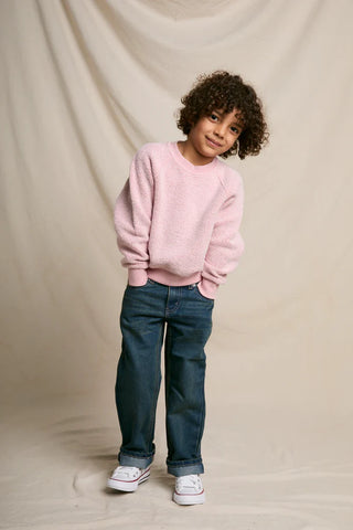 Model is wearing the product and the image is shot on a white backgound. 
