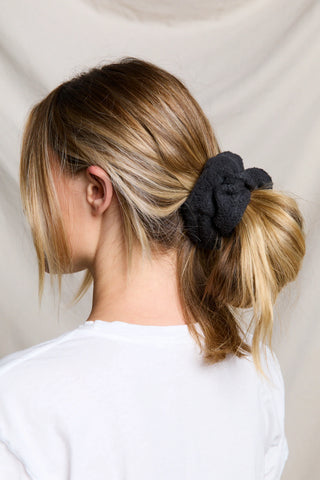 Perfect White Tee Ziggy Fleece Scrunchie Vintage Black. Model is wearing scrunchie. 