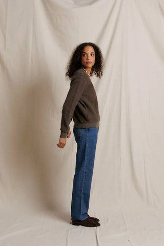 Perfect White Tee Ziggy Reverse Fleece Shrunken Crew Neck Sweatshirt Dark Olive. Model is posing while wearing the product posed on a white background.