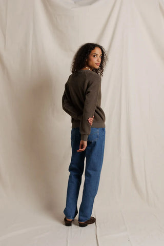 Perfect White Tee Ziggy Reverse Fleece Shrunken Crew Neck Sweatshirt Dark Olive. Model is posing while wearing the product posed on a white background.