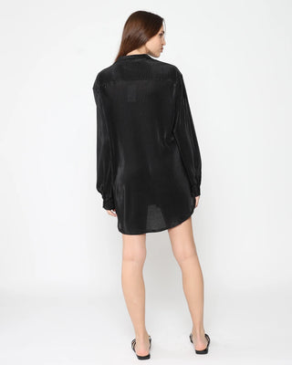 Ripley Rader Black Micropleat Oversized Button Down. Model is wearing the product posing with her back to the camera on white background. 