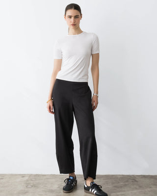 Ripley Rader Black Ponte Knit Barrel Pant. Model is wearing product shot on white background. 