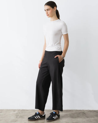 Ripley Rader Black Ponte Knit Barrel Pant. Model is wearing product shot on white background. 