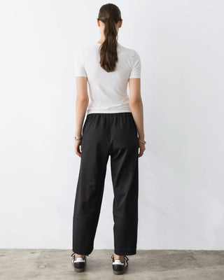 Ripley Rader Black Ponte Knit Barrel Pant. Model is wearing product shot on white background. 
