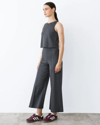 Ripley Rader Charcoal Ponte Knit Tank Top. Model is wearing the top and is posing in front of a white background. 