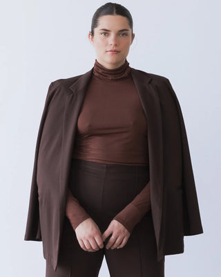 Ripley Rader Chocolate Ponte Knit Oversized Blazer. Model is posing in jacket in front of a white backgorund. 
