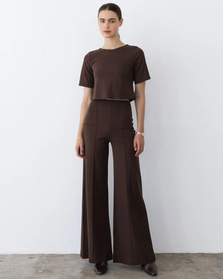 Ripley Rader Chocolate Ponte Knit Wide Leg Pant-Long. Model is wearing the product and is posing on white background. 