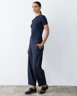 Ripley Rader Navy Ponte Knit Barrel Pant. Model is wearing the product and image is shot on white background. 