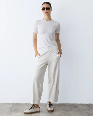 Ripley Rader Off-White Ponte Knit Barrel Pant. Model is wearing the product and the image is shot on a white background. 