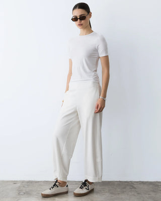 Ripley Rader Off-White Ponte Knit Barrel Pant. Model is wearing the product and the image is shot on a white background. 