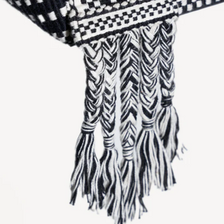 Close-up of Amambaih Chulo Large Tote in Black & Ivory, highlighting its eco-friendly construction, large capacity, and elevated design.