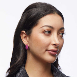 Lele Sadoughi Flamingo Pavé Dome Mini Hoop Earrings with shiny pink pavé crystals covering rounded mini hoops.