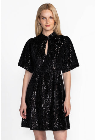 model wears the eve sequin black dress by johnny was