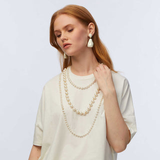 Lele sadoughi headband, Lele sadoughi jewelry, Lele Sadoughi accessories, Lele Sadoughi Ivory Short- Sleeve Pearl Strand Tee, Lele Sadoughi shirts, Lele Sadoughi clothes, Lele Sadoughi pearl shirt, pearl shirt, ivory shirts, white shirts