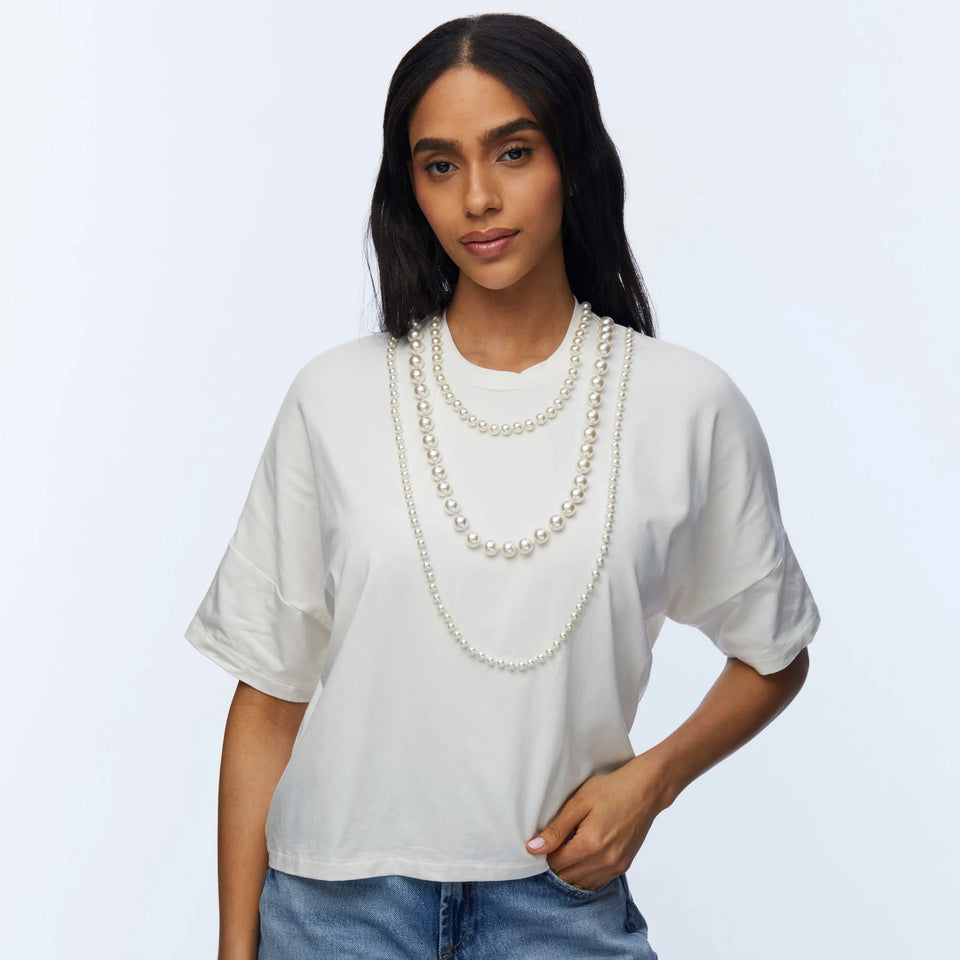 Lele sadoughi headband, Lele sadoughi jewelry, Lele Sadoughi accessories, Lele Sadoughi Ivory Short- Sleeve Pearl Strand Tee, Lele Sadoughi shirts, Lele Sadoughi clothes, Lele Sadoughi pearl shirt, pearl shirt, ivory shirts, white shirts